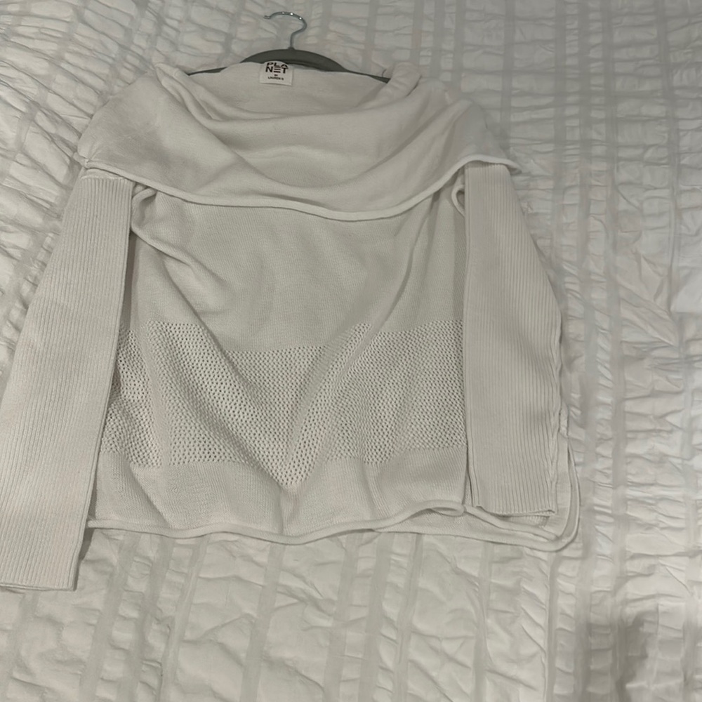 Planet sweater with triangle cut sides on bottom. Can be worn on/ off sh…